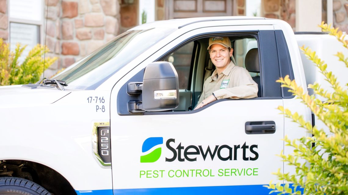 Stewart's pest technician in a truck